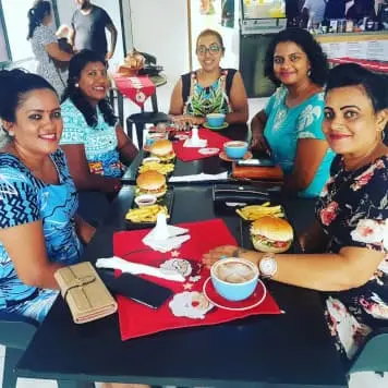 group of people seated at table